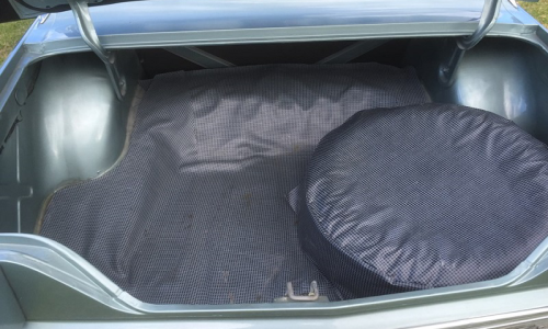 1966 Studebaker Sports Sedan rear trunk mat and spare wheel cover.png