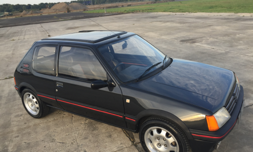 1987 205 GTI with slide back sunroof.png