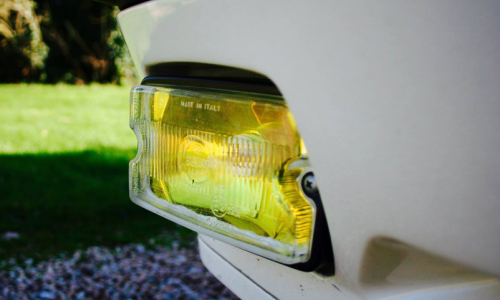 205 GTI Siem driving lights with yellow reflector.png