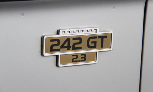 242 GT 2.3 fender badge copy.png