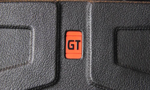 242 GT steering wheel red badge image.png