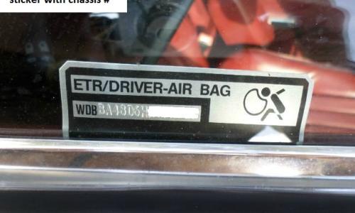 Airbag option tag on drivers windscreen.jpg