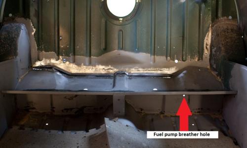 Breather hole location under back seat.jpg