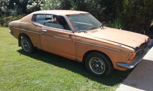 Burnt Orange 1974 Datsun 180B SSS coupe hardtop 610 (1).jpg