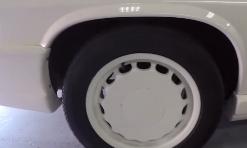 Car with white wheels.png