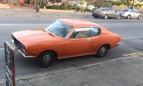 Datsun 180B 610 SSS coupe hardtop orange bronze paint.jpg