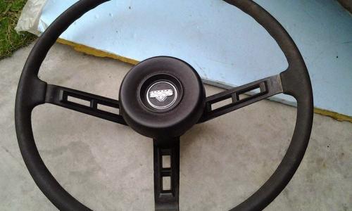 Datsun 180B 610 coupe SSS badge steering wheel round boss.jpg