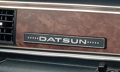 Datsun 180B SSS 610 coupe bluebird dashboard badge.jpg