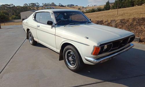 Datsun 180B SSS 610 hardtop Bluebird white paint image.jpg