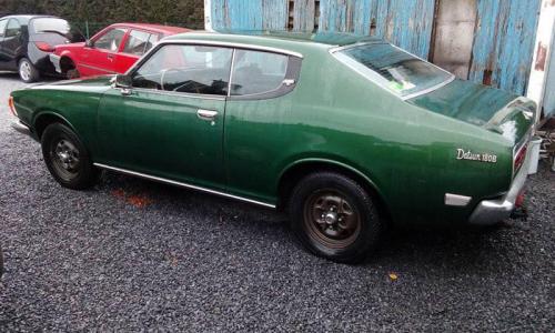 Datsun 180B SSS 610 hardtop coupe dark green paint.jpg