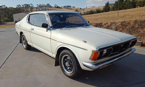 Datsun 180B SSS 610 hardtop coupe white paint.jpg