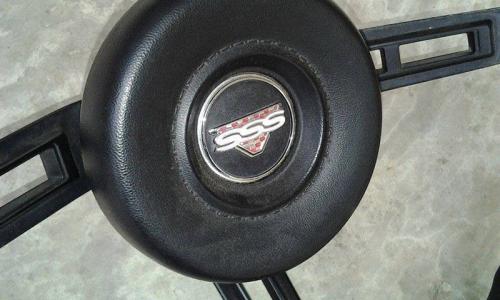 Datsun 180B Steering wheel boss SSS badge image Datsun 610.jpg