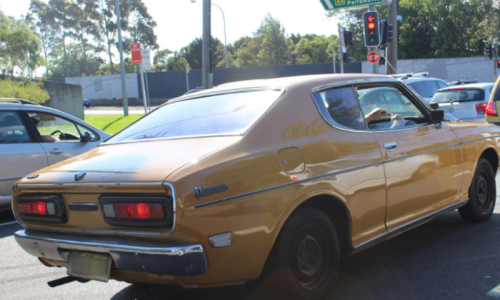 Datsun 180B orange SSS coupe hardtop 610 paint.png