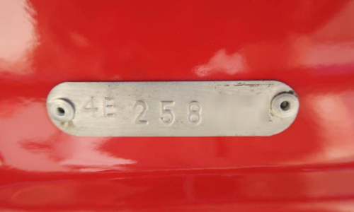E-Type 1968 Body number tag under number plate.png