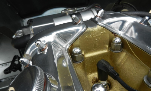 E-Type Jaguar engine number stamping on engine head (1).png