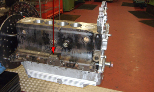 E-type XK-Eengine number location on side of block above oil filter.png