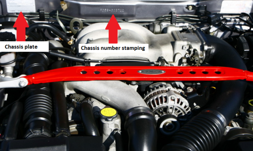 FD RX7 engine bay showing chassis number locations.png