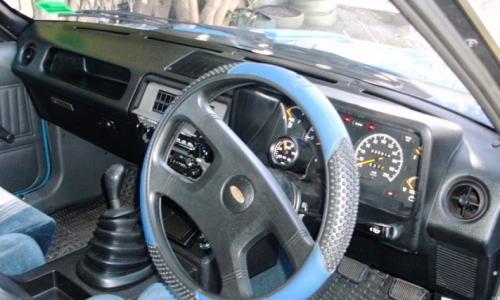 Falcon XE Dick Johnson Grand Prix interior blue grey scheel seats dashboard.jpg