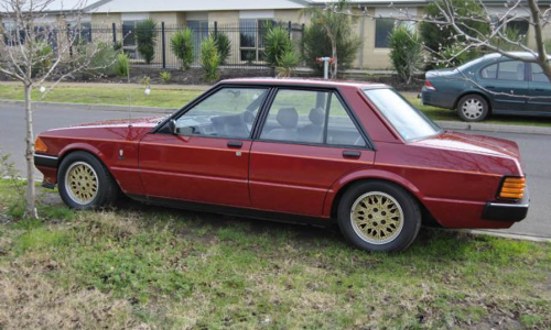 Ford Fairmont Ghia XE ESP Hermitage red paint code L (1).png