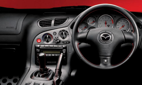 Promotional interior shot dashboard RX-7 Spirit R Type A.png
