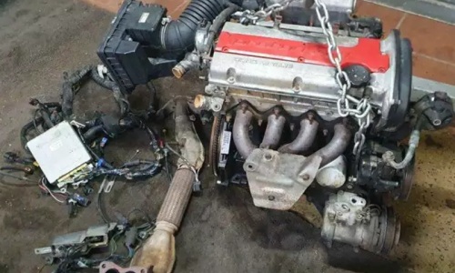 Proton Satria GTi engine and gearbox out of car image.png