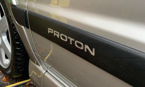 Proton badge front door Satria GTI image.jpg