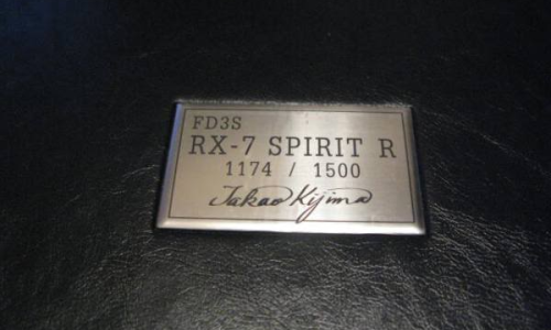 RX-7 Spirit R handbook badge.png