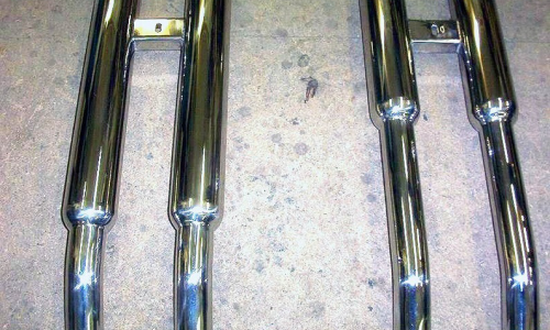 Series 1 E-type Jaguar Exhaust pipe differences 3.8l vs 4.png