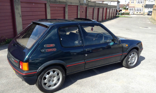Sorrento Green 205 GTI with sunroof 1990 copy.png