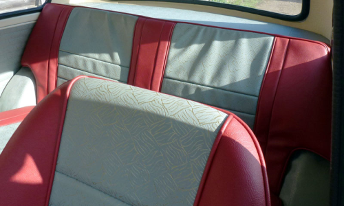 Tartan Red and Gold Brocade Grey seat trim MK1 Cooper S close up.png