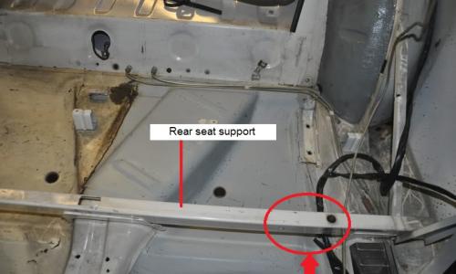 VIN location Saab 99 under rear seat chassis number.jpg
