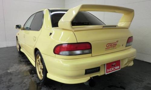 Version 6 sedan yellow.jpg