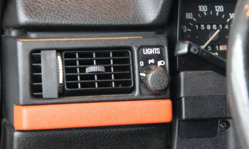 Volvo 242 GT dashboard red stripe.png