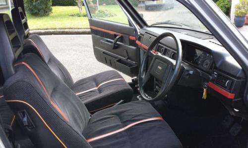 Volvo 242 GT red and black interior image.jpg