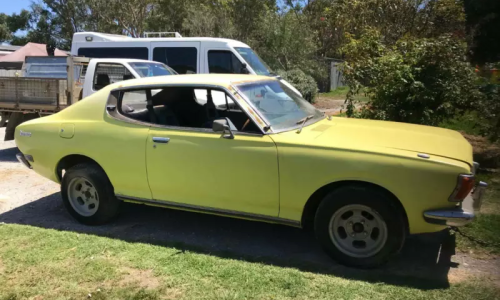 Yellow Datsun 180B SSS 1974 harcdtop coupe images Australia 2021 (1).png