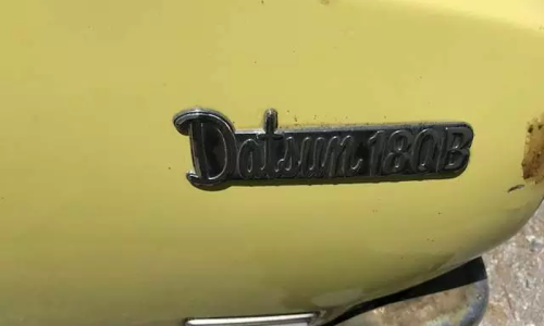 Yellow Datsun 180B SSS rear badge 1974 images Australia 2021 (2).png