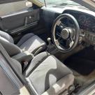1989 Ford Telstar Turbo hatch white on grey (2).jpg