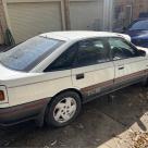 1989 Ford Telstar Turbo hatch white on grey (5).jpg