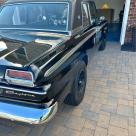 Black 1965 Studebaker Daytona sport sedan coupe 2024 (3).jpg