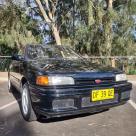 For sale Mazda BG GTX hatch import to Australia black (5).jpg