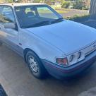 Ford Laser TX3 AWD white rare Australia (2).jpg