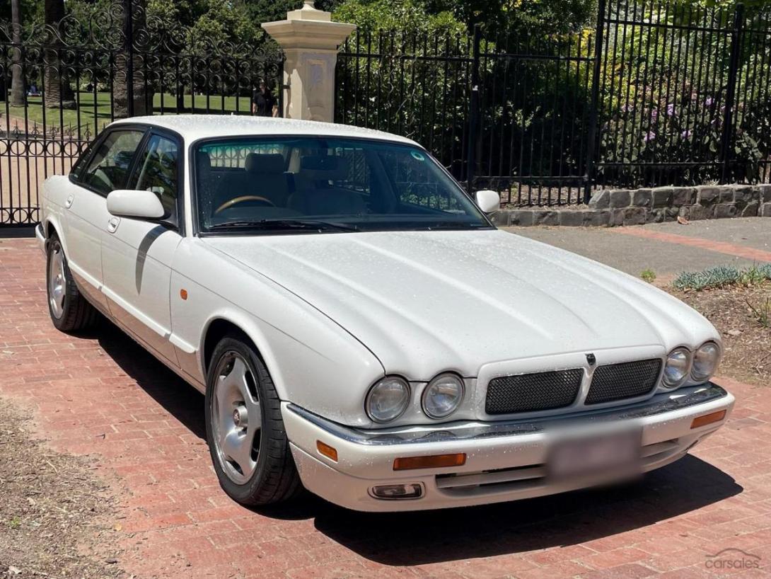 1997 Jaguar XJR 4.0 Supercharged white sedan Australia RHD (1).jpg