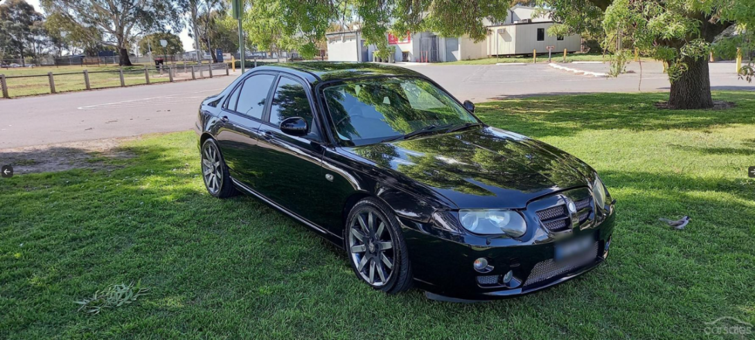 Black 2004 MG ZT 260 sedan Australia (1).png